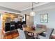Elegant dining area with a round table and modern chairs at 800 N Tamiami Trl # 1412, Sarasota, FL 34236