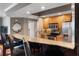 Modern kitchen with granite countertops and stainless steel appliances at 800 N Tamiami Trl # 1412, Sarasota, FL 34236