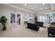 Welcoming lounge area with comfortable seating and a variety of entertainment options at 16215 Tradewind Ter, Lakewood Ranch, FL 34211