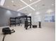 Functional training room with state-of-the-art equipment and a sleek, modern design at 16215 Tradewind Ter, Lakewood Ranch, FL 34211