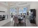 Bright dining room with contemporary design and plenty of natural light at 3543 Recurve Cir, Sarasota, FL 34240