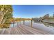 Wooden dock with access to the waterway at 3920 Roberts Point Rd, Sarasota, FL 34242