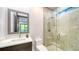 Clean bathroom, glass shower, updated vanity at 3920 Roberts Point Rd, Sarasota, FL 34242