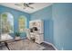 Bright home office with built-in hutch and blue walls at 4931 131St E Dr, Parrish, FL 34219