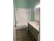 Modern bathroom with a vanity, shower, and tub combination, accented by updated fixtures at 5152 Northridge Rd # 302, Sarasota, FL 34238