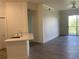 Bright and airy living room featuring modern finishes and an open layout with kitchen view at 5152 Northridge Rd # 302, Sarasota, FL 34238