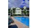 Resort-style pool with plenty of space to relax, and attractive landscaping at 5152 Northridge Rd # 302, Sarasota, FL 34238