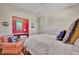 Bedroom featuring built-in desk, shelving, and a comfy chair, perfect for relaxation and functionality at 7235 Rangi Dr, Sarasota, FL 34241