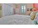 Tranquil bedroom with a large closet, light-colored walls, and a cozy atmosphere, perfect for relaxation at 7235 Rangi Dr, Sarasota, FL 34241