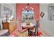 Cozy dining room with decorative chandelier and round table; perfect for Gathering meals at 7235 Rangi Dr, Sarasota, FL 34241