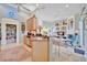 Bright, open kitchen with island seating and clear sight lines to the Gathering room at 7235 Rangi Dr, Sarasota, FL 34241