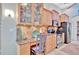 Modern kitchen featuring stainless steel appliances, granite countertops, and wood cabinetry at 7235 Rangi Dr, Sarasota, FL 34241