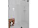 Shower with teak stool and tile surround at 7235 Rangi Dr, Sarasota, FL 34241