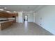 Large living room with an open floor plan, tile flooring, recessed lighting, and potential for customized design at 766 Hillshire Pl, Spring Hill, FL 34609