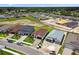 An aerial of new homes displays the layout, landscaping, and community, showcasing a desirable residential area at 774 Hillshire Pl, Spring Hill, FL 34609