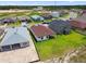 An aerial view showcases the home's spacious backyard and its location within a vibrant residential neighborhood at 774 Hillshire Pl, Spring Hill, FL 34609