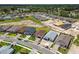 This aerial shows a growing neighborhood of single-Gathering homes, offering a sense of community and convenience at 774 Hillshire Pl, Spring Hill, FL 34609