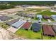 This aerial view showcases an established neighborhood with single-Gathering homes and convenient nearby construction at 774 Hillshire Pl, Spring Hill, FL 34609