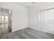Bedroom featuring an ensuite bathroom and closet with sliding doors at 774 Hillshire Pl, Spring Hill, FL 34609
