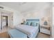 Spacious bedroom with ensuite bathroom access at 800 N Tamiami Trl # 1111, Sarasota, FL 34236