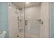 Large walk-in shower with marble tile and glass enclosure at 800 N Tamiami Trl # 1111, Sarasota, FL 34236