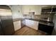 Updated kitchen with stainless steel appliances and granite countertops at 9612 Valencia Cv, Bradenton, FL 34210