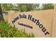 Palma Sola Harbour Condominium sign at entrance at 9612 Valencia Cv, Bradenton, FL 34210