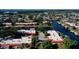 Aerial view of waterfront community, showcasing private boat docks and deep water access at 9612 Valencia Cv, Bradenton, FL 34210