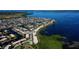 Aerial view of coastal community featuring waterway access and beautiful shoreline at 9612 Valencia Cv, Bradenton, FL 34210