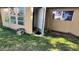 Ground level exterior view of condo with small yard at 9612 Valencia Cv, Bradenton, FL 34210