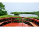 Wooden deck offering scenic waterway views at 9612 Valencia Cv, Bradenton, FL 34210