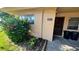 Front exterior of property featuring a well-manicured lawn and front entryway at 9612 Valencia Cv, Bradenton, FL 34210