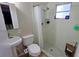Updated bathroom with walk-in shower and tile flooring at 9612 Valencia Cv, Bradenton, FL 34210
