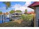 Home's private boat dock and lift provide direct access to the waterfront and nearby boating at 9612 Valencia Cv, Bradenton, FL 34210