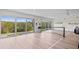 Indoor pickleball court with sliding glass doors at 4013 Catalina Dr # 4013, Bradenton, FL 34210