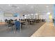 Community room featuring numerous tables and chairs, ideal for gatherings at 4013 Catalina Dr # 4013, Bradenton, FL 34210