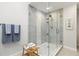 Spacious walk-in shower with modern gray tile and glass enclosure at 4013 Catalina Dr # 4013, Bradenton, FL 34210