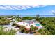 Community pool and tennis courts with a scenic waterfront view at 4013 Catalina Dr # 4013, Bradenton, FL 34210
