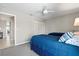 Guest bedroom with two twin beds and access to a hallway at 4013 Catalina Dr # 4013, Bradenton, FL 34210