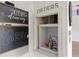 Small kitchen nook with chalkboard and unique storage at 4013 Catalina Dr # 4013, Bradenton, FL 34210