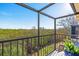 Spacious screened balcony showcasing tranquil nature views at 4013 Catalina Dr # 4013, Bradenton, FL 34210