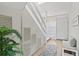 Inviting entryway with built-in bench and decorative rug at 4013 Catalina Dr # 4013, Bradenton, FL 34210