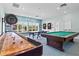 Community game room with billiard table, shuffleboard, and ping pong at 4013 Catalina Dr # 4013, Bradenton, FL 34210