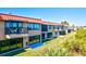 View of multiple townhouses with balconies and a waterfront setting at 4013 Catalina Dr # 4013, Bradenton, FL 34210