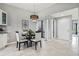Modern dining area with four chairs and a round table at 4013 Catalina Dr # 4013, Bradenton, FL 34210