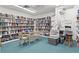 Community library with ample bookshelves and seating at 4013 Catalina Dr # 4013, Bradenton, FL 34210