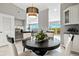 Bright dining area with a round table and four chairs, offering water views at 4013 Catalina Dr # 4013, Bradenton, FL 34210