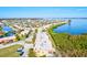 Aerial view showcasing a community of waterfront homes and lush landscaping at 4013 Catalina Dr # 4013, Bradenton, FL 34210