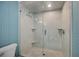 Large walk-in shower with marble tile and glass enclosure at 800 N Tamiami Trl # 1111, Sarasota, FL 34236