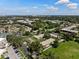 Wide aerial view of a community with numerous buildings and green spaces at 390 301 W Blvd # 5C, Bradenton, FL 34205